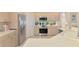 Bright kitchen with stainless steel appliances, stylish cabinets and a practical layout at 407 Fieldstone Dr, Venice, FL 34292