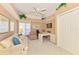 Comfortable office space with a ceiling fan, built-in desk, and a serene atmosphere at 407 Fieldstone Dr, Venice, FL 34292