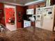 Cozy eat-in kitchen with dark wood cabinets and stainless appliances at 4170 Prudence Dr, Sarasota, FL 34235