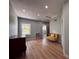 Bedroom with hardwood floors, natural light, and neutral paint scheme at 4576 Cooper Rd, Sarasota, FL 34232