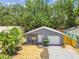 Inviting single-story home with a freshly painted exterior and a well-maintained front yard, enhancing curb appeal at 4741 Watkins Ave, Sarasota, FL 34233