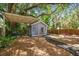 Backyard cottage with a seating area and pergola, offering a secluded retreat at 4741 Watkins Ave, Sarasota, FL 34233