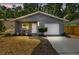 Charming single-story home with a freshly painted exterior and a well-maintained front yard, perfect for curb appeal at 4741 Watkins Ave, Sarasota, FL 34233