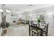 Open-concept area with living room and dining space, showcasing the bright, airy atmosphere at 4741 Watkins Ave, Sarasota, FL 34233