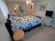 Relaxing bedroom featuring bright natural light and a desk at 4920 Boca Raton Ave, Sarasota, FL 34234