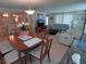 Open-concept living and dining area with comfortable seating, ideal for entertaining at 4920 Boca Raton Ave, Sarasota, FL 34234