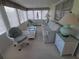 Bright sunroom with wicker furniture, lots of light, and relaxing atmosphere at 4920 Boca Raton Ave, Sarasota, FL 34234