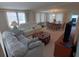 Spacious living room featuring comfortable seating, natural light, and an inviting atmosphere at 4920 Boca Raton Ave, Sarasota, FL 34234