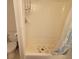 Compact shower stall features an updated shower head and bathroom accessories at 4920 Boca Raton Ave, Sarasota, FL 34234