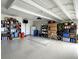 Spacious and well-organized garage with ample storage shelves, offering room for bicycles and other equipment at 4970 Oyster Pearl St, Lakewood Ranch, FL 34211