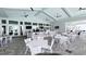 An outdoor restaurant area features tables, chairs, and a bar for a casual dining experience at 4970 Oyster Pearl St, Lakewood Ranch, FL 34211