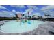 A splash pad features colorful water features and slides, perfect for Gathering fun at 4970 Oyster Pearl St, Lakewood Ranch, FL 34211