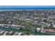 Stunning aerial view of a waterfront community with easy access to beaches and deep water canals at 5033 Oxford Dr, Sarasota, FL 34242