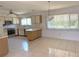 Bright kitchen features white appliances, lots of cabinets, and plenty of natural light at 5315 Malamin Rd, North Port, FL 34287