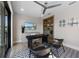 Bright home office features large window, modern decor, and built-in bookcase at 540 S Polk Dr, Sarasota, FL 34236