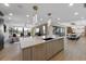 Open-concept kitchen island, seamlessly transitioning to living and dining areas at 540 S Polk Dr, Sarasota, FL 34236