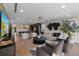 Expansive living room with modern furniture, open floor plan, and abundant natural light at 540 S Polk Dr, Sarasota, FL 34236