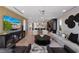 Open-concept living area featuring modern decor, wood accents, and a view of the kitchen at 540 S Polk Dr, Sarasota, FL 34236