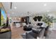 Expansive living room with modern furniture, open floor plan, and abundant natural light at 540 S Polk Dr, Sarasota, FL 34236