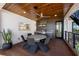 Outdoor dining area with wood-paneled ceiling and built-in stainless steel grill at 540 S Polk Dr, Sarasota, FL 34236