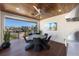Outdoor dining area with wood-paneled ceiling and built-in stainless steel grill at 540 S Polk Dr, Sarasota, FL 34236