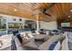 Outdoor living space featuring comfortable seating, a pool, and bar area at 540 S Polk Dr, Sarasota, FL 34236