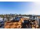Spacious rooftop deck with outdoor seating, lounge chairs, and stunning city views, perfect for entertaining at 540 S Polk Dr, Sarasota, FL 34236