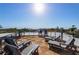 Rooftop patio featuring lounge chairs and outdoor seating, an ideal place to relax and enjoy the sunny views at 540 S Polk Dr, Sarasota, FL 34236