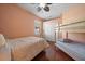 Bright bedroom with a double bed and bunk bed, and a spacious closet with paneled doors at 5624 Aaron Ct, Sarasota, FL 34232