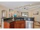 Modern kitchen with granite countertops, stainless steel appliances, and open to the living area at 5624 Aaron Ct, Sarasota, FL 34232