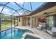Screened-in lanai with a private swimming pool and jacuzzi, great for entertaining and relaxation at 5624 Aaron Ct, Sarasota, FL 34232