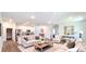 Beautiful living room with a modern design and an open layout, perfect for entertaining at 5672 Jonesboro Ave, North Port, FL 34288