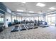 Well-equipped fitness center featuring multiple treadmills, ceiling fans and large windows at 5821 Valente Pl, Sarasota, FL 34238