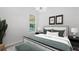 Comfortable bedroom featuring modern furnishings and decor at 5821 Valente Pl, Sarasota, FL 34238