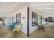 Wrap-around porch offers multiple seating areas, perfect for enjoying the outdoors and sea breezes at 601 Gulf S Dr, Bradenton Beach, FL 34217