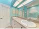 Bathroom featuring double sinks, a large mirror, and a separate shower and tub at 6106 New Paris Way, Ellenton, FL 34222