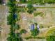 Acreage featuring a small residence, pond, and lush lawns, offering peaceful seclusion at 6321 279Th E St, Myakka City, FL 34251