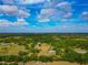 Sprawling acreage featuring a barn, a home, and scenic, lush surroundings at 6321 279Th E St, Myakka City, FL 34251