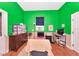 Bright bedroom with hardwood floors, a desk, storage containers, and plenty of natural light at 6321 279Th E St, Myakka City, FL 34251