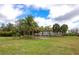 Charming single-story home with mature landscaping and a spacious front yard at 6321 279Th E St, Myakka City, FL 34251