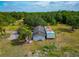 Home exterior with utility building at 6321 279Th E St, Myakka City, FL 34251