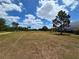 Spacious lot features mature landscaping, scattered trees, and ample open space perfect to build your home at 6321 279Th E St, Myakka City, FL 34251