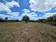 A sprawling, lush property with mature trees is ready for you to call home at 6321 279Th E St, Myakka City, FL 34251