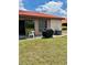 View of backyard with grill at 6368 Draw Ln # 34, Sarasota, FL 34238