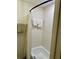 Bright bathroom with a shower/tub combo and neutral colored tiles at 6368 Draw Ln # 34, Sarasota, FL 34238