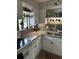 Well-designed kitchen with stainless steel sink, granite countertops, and modern appliances at 6368 Draw Ln # 34, Sarasota, FL 34238