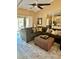 Bright living room featuring a large sectional sofa and stylish decor at 6368 Draw Ln # 34, Sarasota, FL 34238