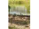 View of pond from backyard at 6368 Draw Ln # 34, Sarasota, FL 34238