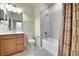 Well-lit bathroom with a tub/shower combo, and a vanity with a mirror at 6406 Grand Estuary Trl # 102, Bradenton, FL 34212