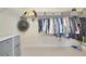 Spacious walk-in closet featuring ample shelving and hanging storage for organization at 6406 Grand Estuary Trl # 102, Bradenton, FL 34212